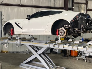 Corvette collision repair on frame equipment