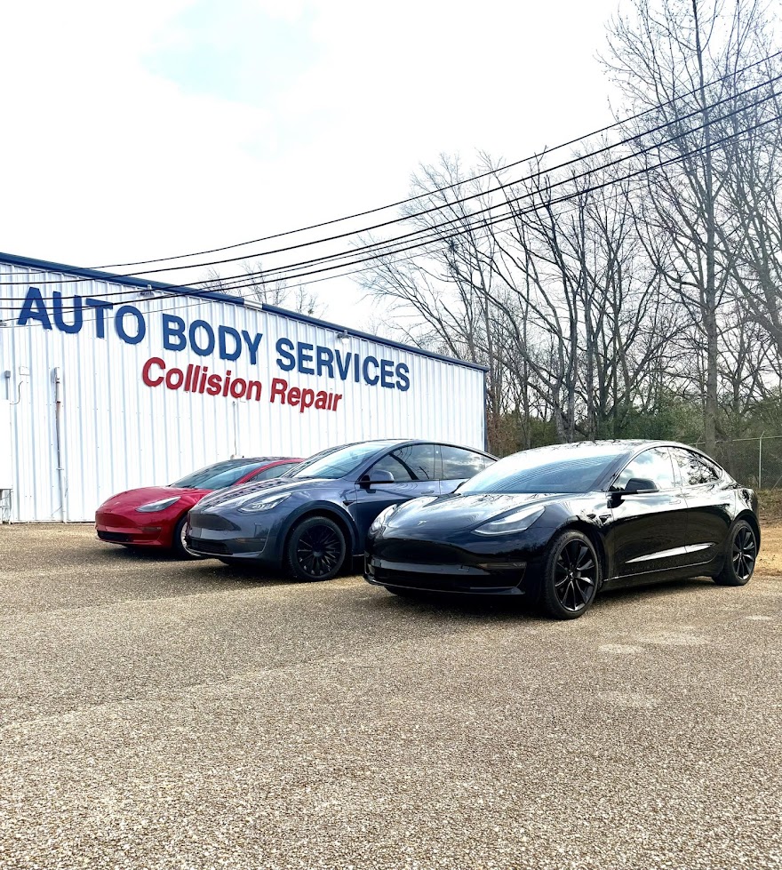 Three Tesla vehicles at Auto Body Services Inc., Prattville